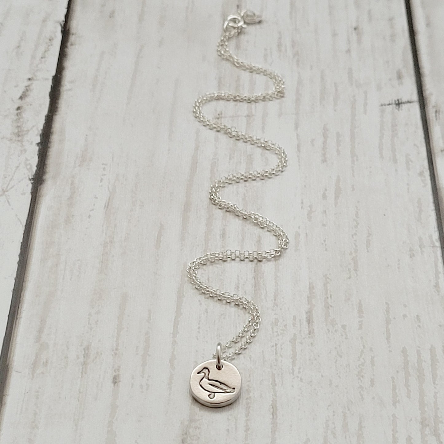 Sterling-silver-tiny-duck-bird-pendant-necklace-1