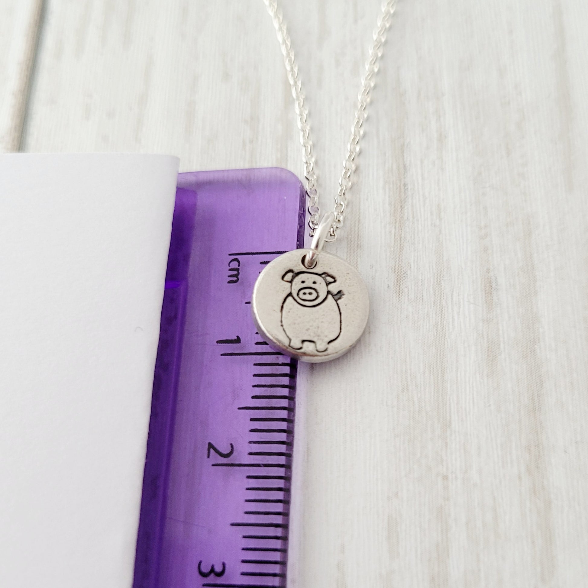 Sterling-silver-tiny-pig-pendant-necklace-6