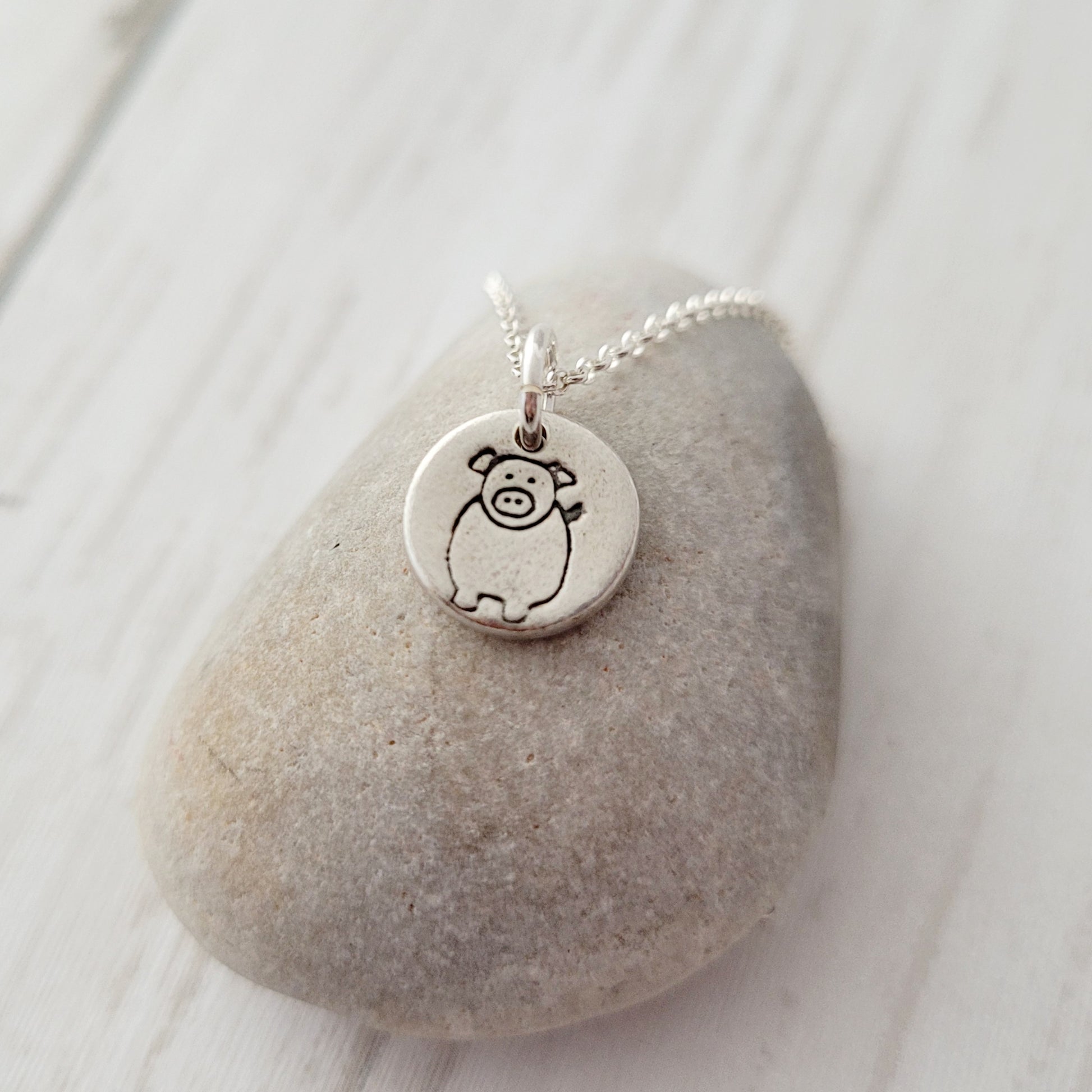 Sterling-silver-tiny-pig-pendant-necklace-3