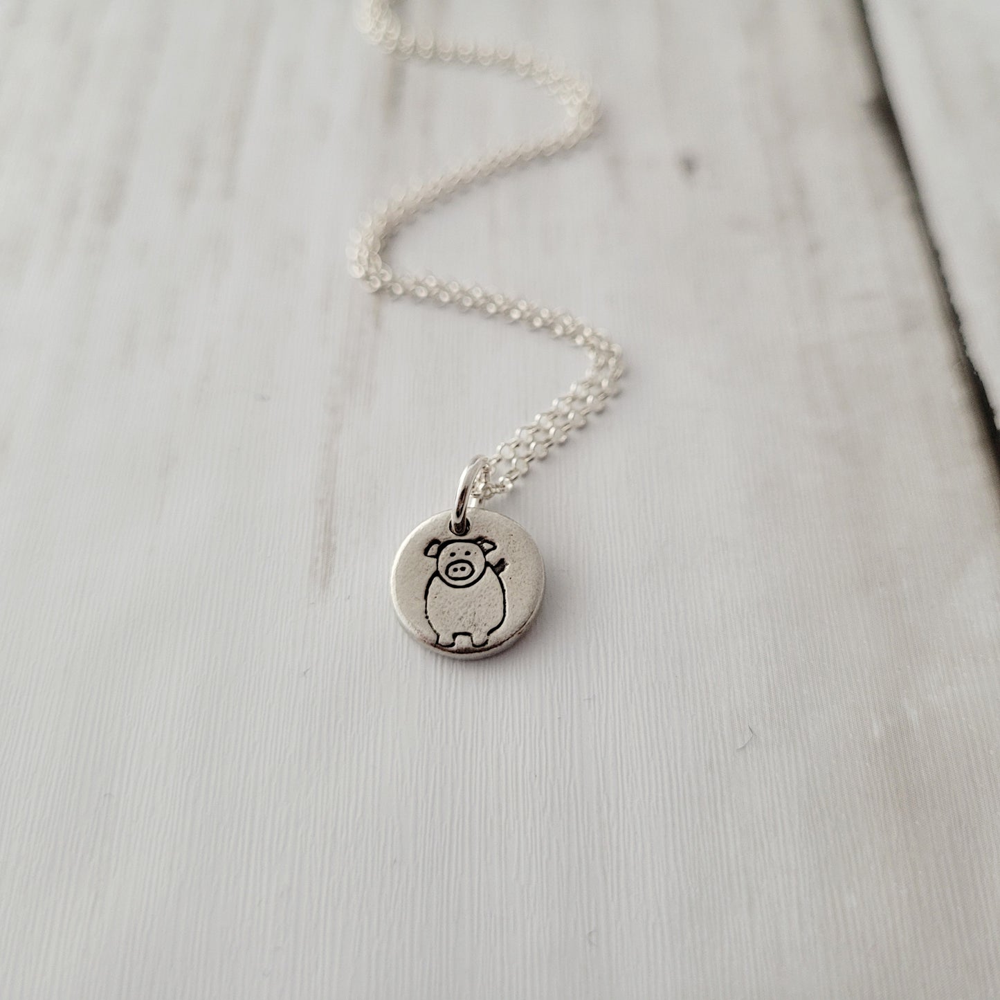 Sterling-silver-tiny-pig-pendant-necklace-4