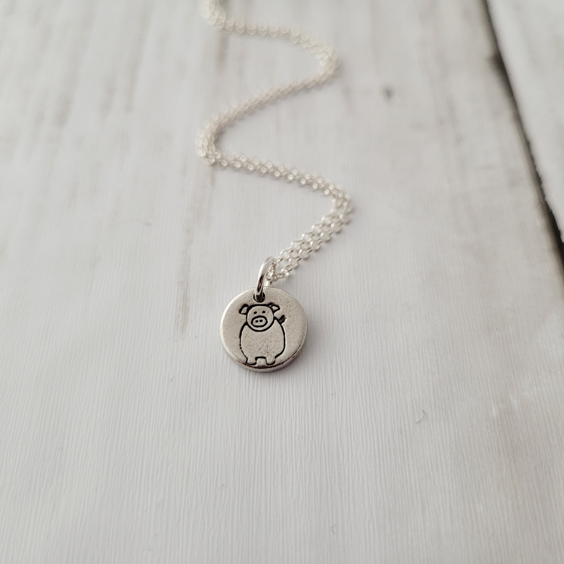 Sterling-silver-tiny-pig-pendant-necklace-4