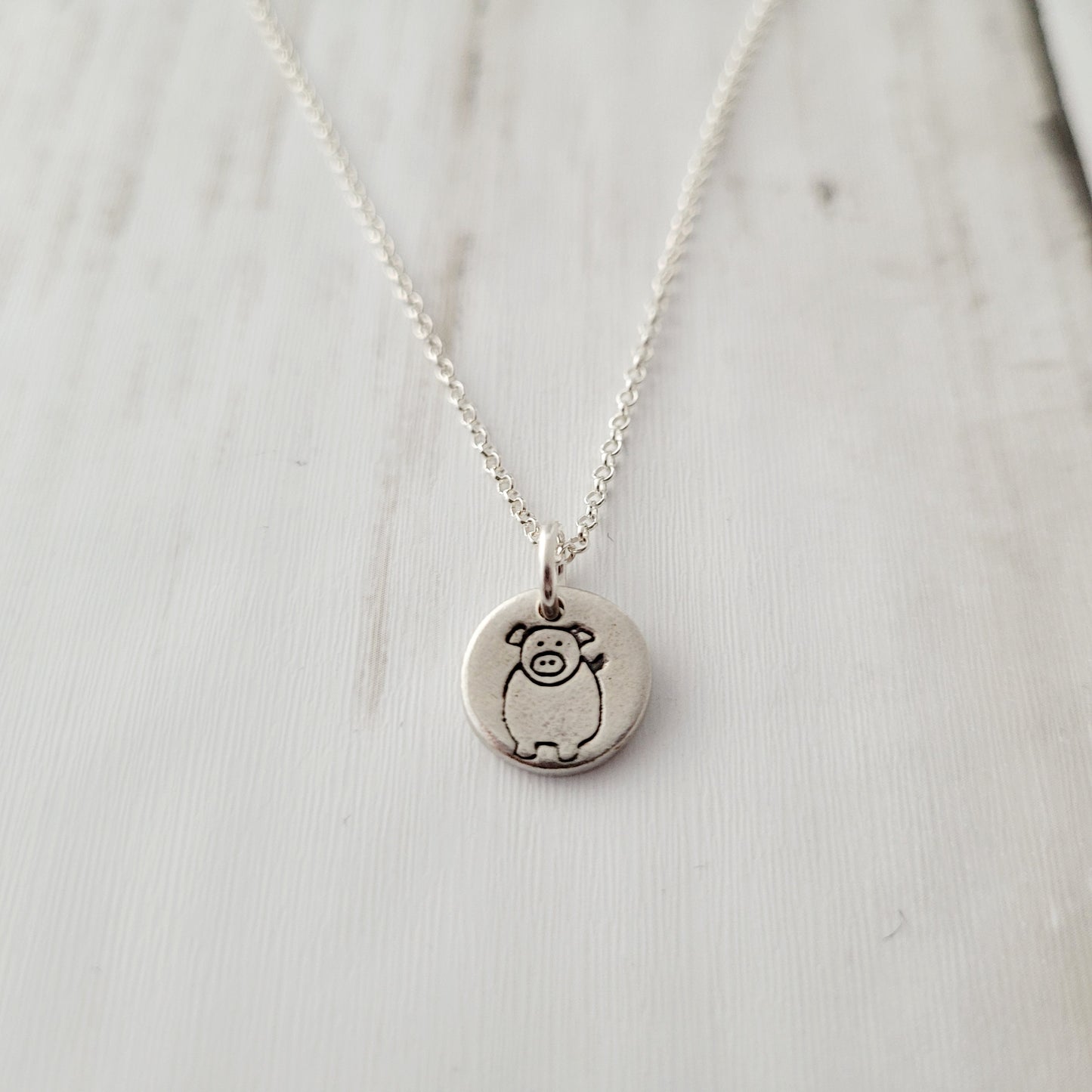 Sterling-silver-tiny-pig-pendant-necklace-2