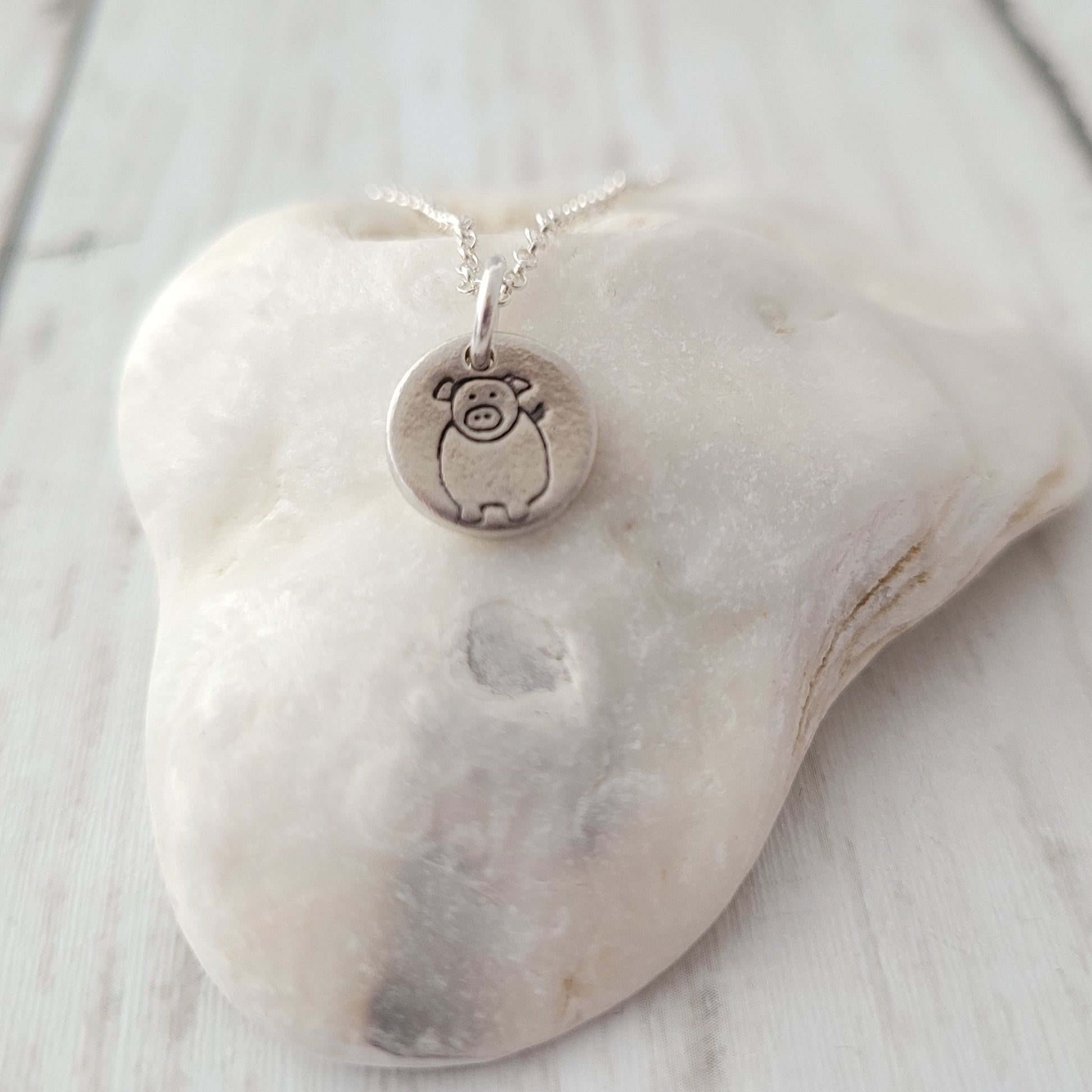 Sterling-silver-tiny-pig-pendant-necklace-1