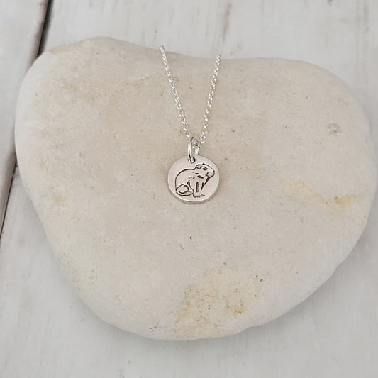 sterling silver capybara round pendant on stone