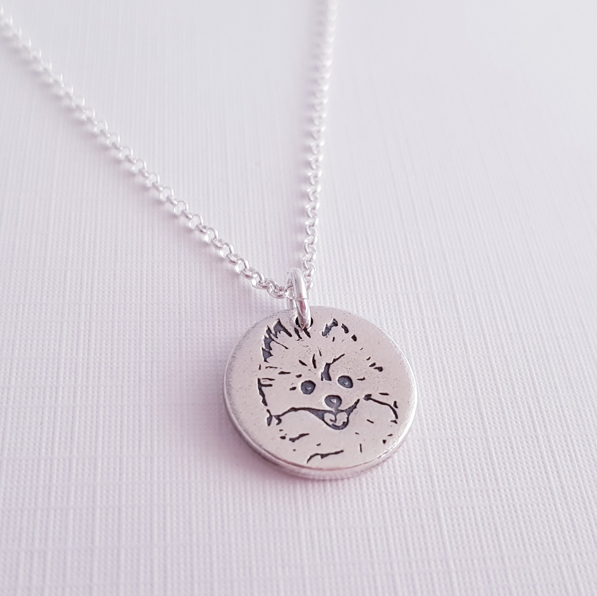 round cute dog face pendant side view
